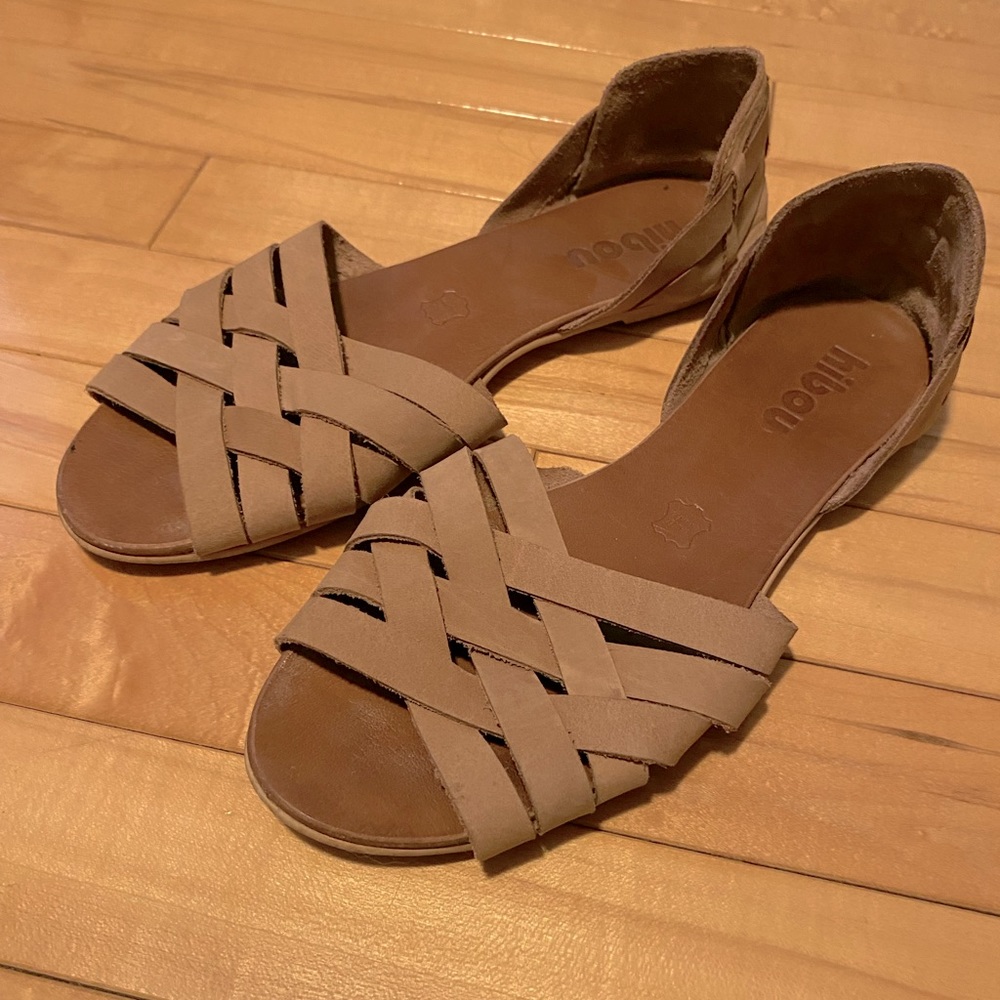 Hibou flat sandals.